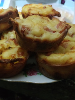 Una foto de Muffins de muzzarella y jamón