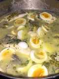 Filetes de merluza con guisantes al pil pil
