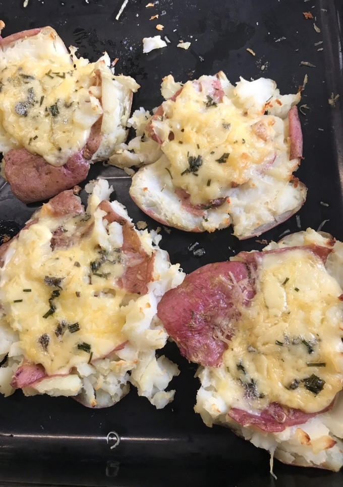 Una foto de Papas escrachadas 3 quesos