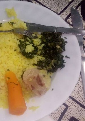A picture of Tumeric rice with fried vegetables.