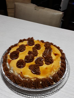 Una foto de Isla flotante c/dulce de leche. Grace