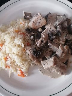 Una foto de Filete de puerco con portobello