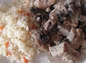 Una foto de Filete de puerco con portobello
