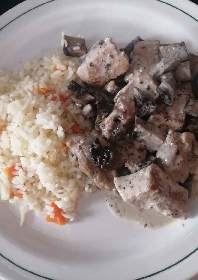 Una foto de Filete de puerco con portobello