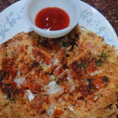 A picture of Crispy Poha Uttappa.