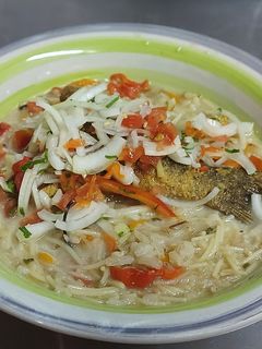 Una foto de Jugoso con Pescado Frito