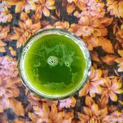 A picture of Apple,Palak, Cucumber juice.