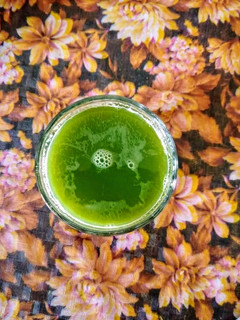 A picture of Apple,Palak, Cucumber juice.