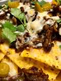 Nachos with Meat, Cheese, and Poblano Peppers