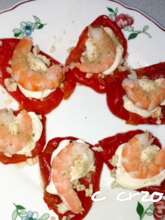 Una foto de Tapa de pimientos con langostinos