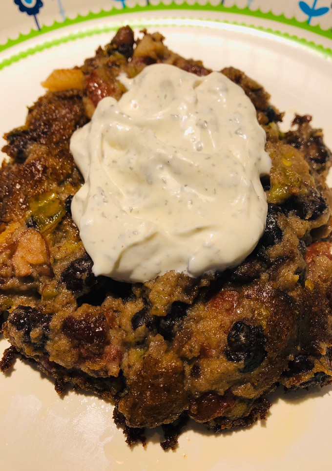 A picture of 2 - Bean Spicy🌶Cakes With Sour Cream Sauce.