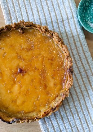 A picture of Lemon Tart with Almond & Walnut Crust.