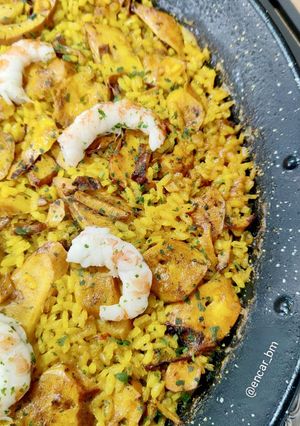 Una foto de Arroz con pota y gambón