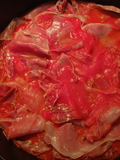 Una foto de Magras con tomate