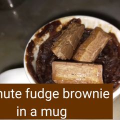 A picture of 1 minute fudge brownie eggless in a mug.