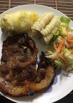 Una foto de Chuleta frita al estilo peruano