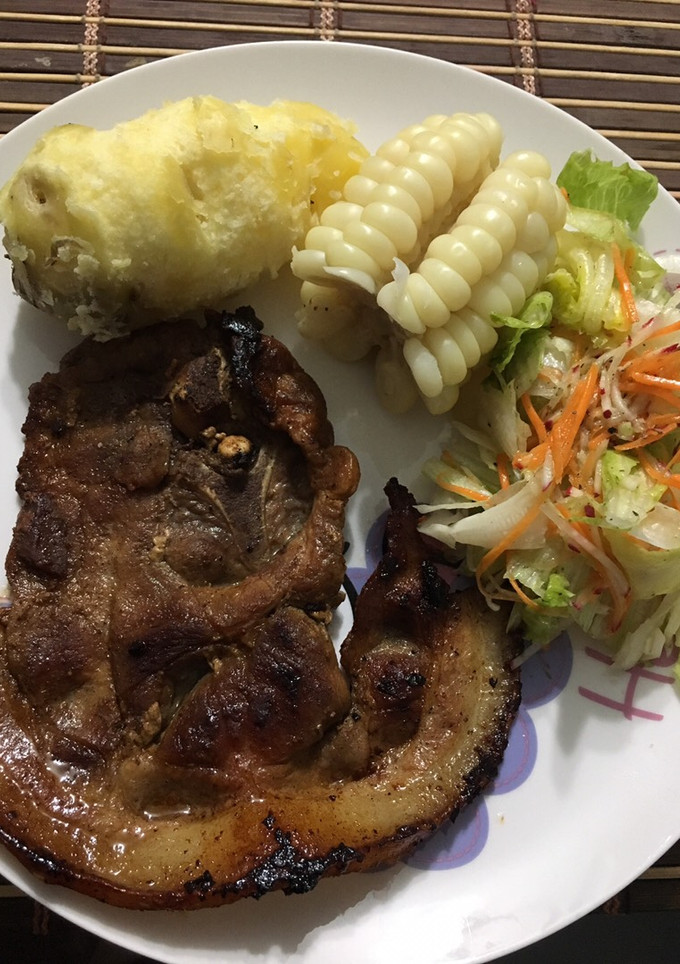 Una foto de Chuleta frita al estilo peruano