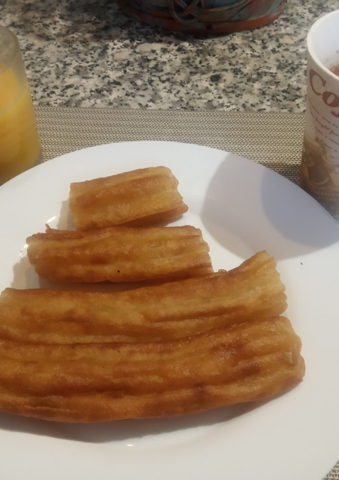 Una foto de Porras en Freidora de Aire o Tostador y chocolate a la taza