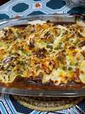 Coliflor gratinado y arvejas