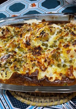 Una foto de Coliflor gratinado y arvejas