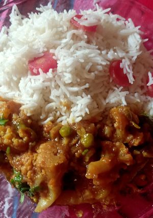 A picture of Mix veg with white rice.
