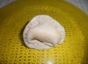 Una foto de Capelletti de mozarella y calabaza