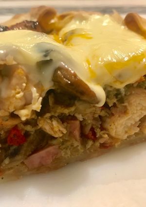 Una foto de Tarta de puerro, pollo y Champignones