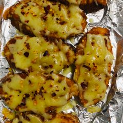 A picture of Tiger baton with pesto and cheese.