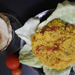 A picture of Vegetable khichdi sizzler.