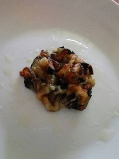 Una foto de Berenjena frita con queso