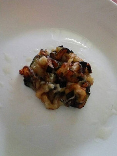 Una foto de Berenjena frita con queso
