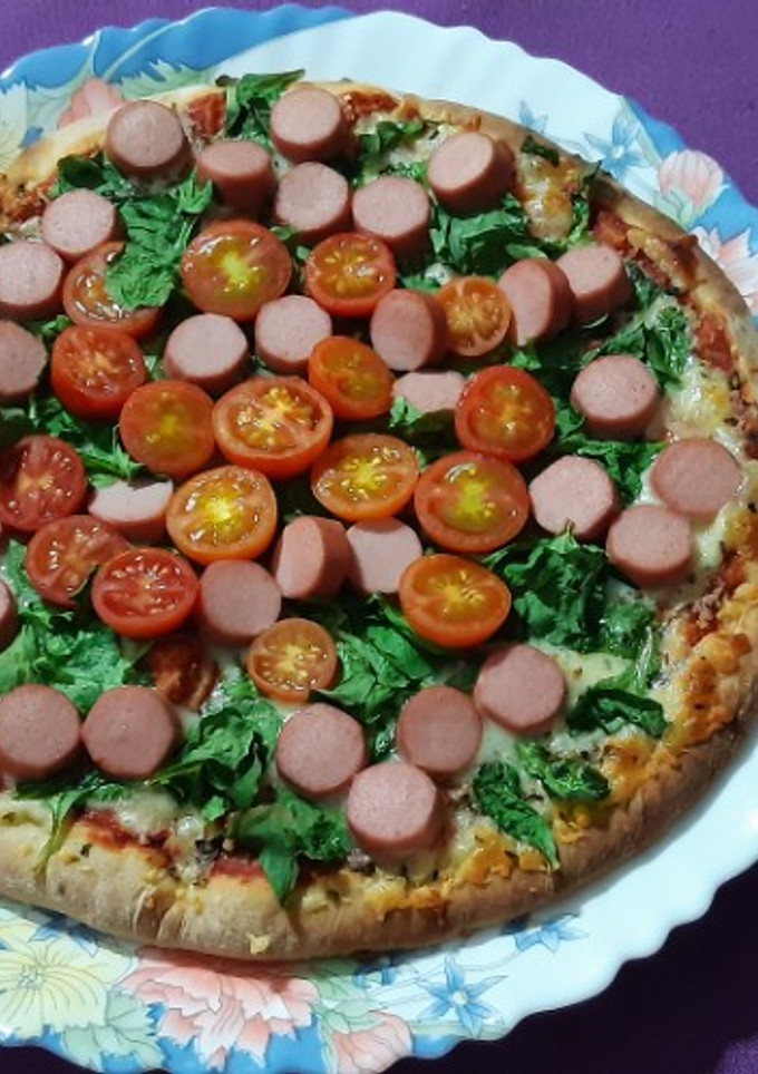 Una foto de Pizza con sabor alemán