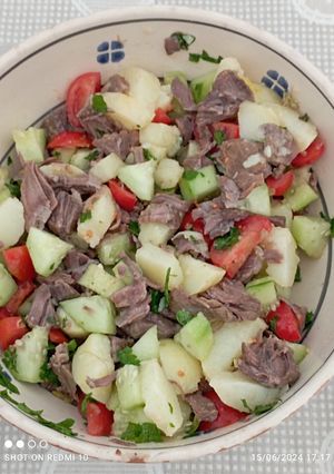 A picture of Summer Meat Salad with New Potatoes and Cucumbers.