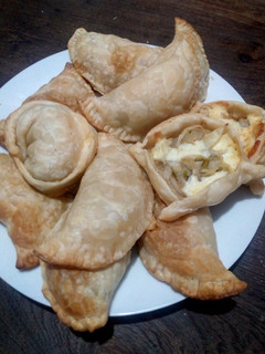 Una foto de Empanadas de cebolla con queso
