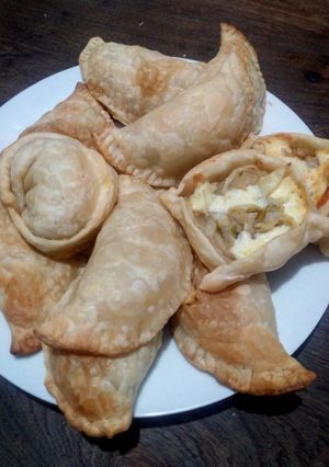 Una foto de Empanadas de cebolla con queso
