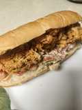 Brad's lobster roll with fried pacific oysters