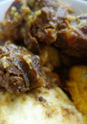 A picture of Dumpling and beef stew.