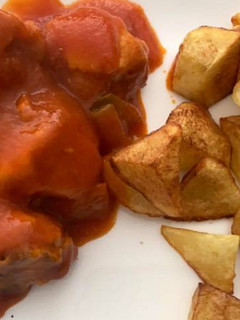 Una foto de Conejo con tomate