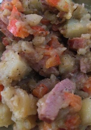 A picture of Potatoes and sausage.