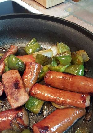 A picture of Sausage, peppers, and onions.