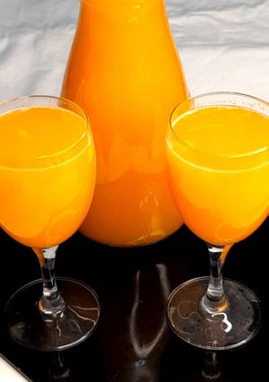 Une photo de Jus orange carotte