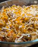 Tallarines con vegetales y gambones