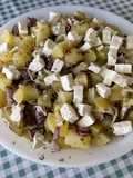 Salade de pommes de terre, chou blanc, oignon rouge et feta