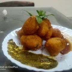A picture of Moong Dal Laddoo With Chutney.