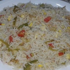 A picture of Chicken veggi fried rice.