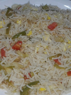 A picture of Chicken veggi fried rice.
