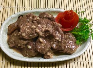 Hình của món Bắp bò gói giấy bạc đút lò.