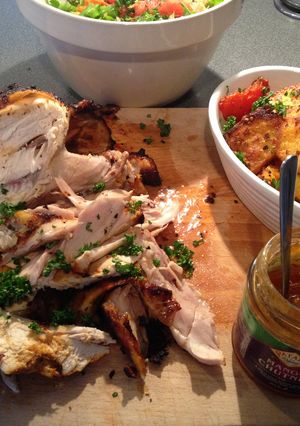 A picture of Jamie Oliver's Empire Chicken with Bombay-style Roast Potatoes.