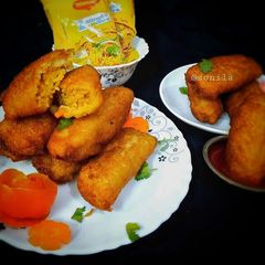 A picture of Maggi stuffed bread spring roll.