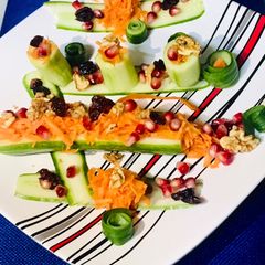 A picture of Salad with richness of walnuts & dried cranberries.